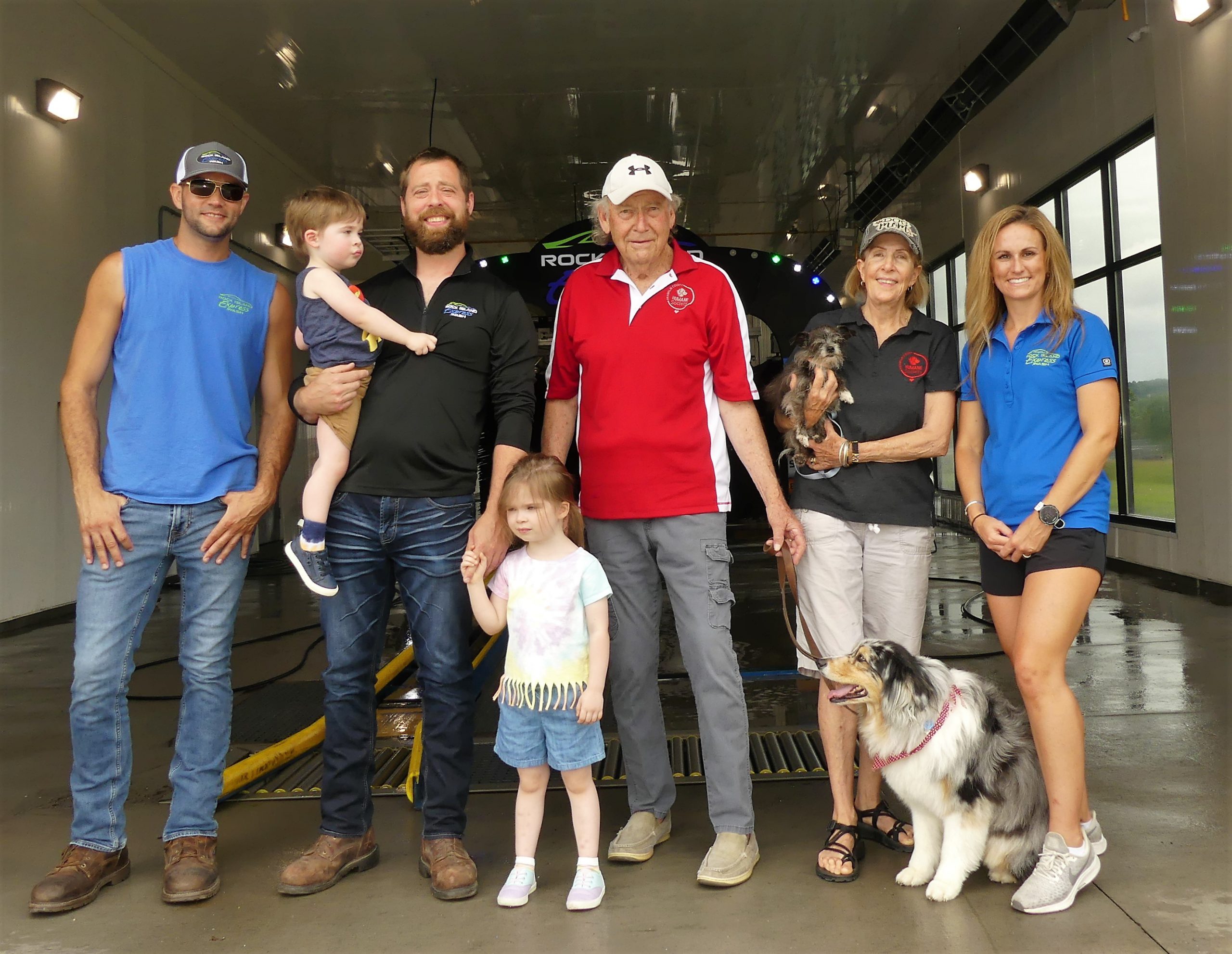 Jeff Fox, Zach Hagedorn holding son Fred, daughter Charley Hagedorn, Ron Foan, Pat Foan, and Jessica Fox. Slippers and Bandit, too, of course.